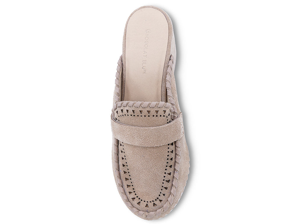 A latte suede wedge mule with decorative hand-stitched detailing and perforation - top view
