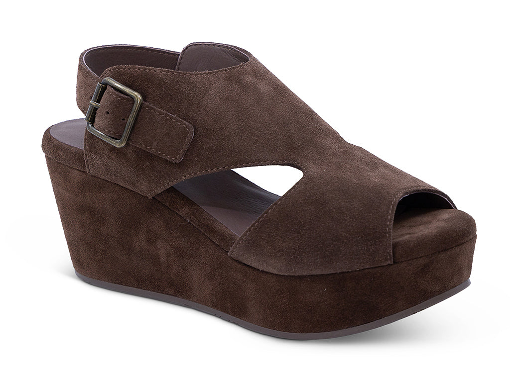 a chocolate suede upper wedge sandal with cut outs and ankle strap - front 3/4 view