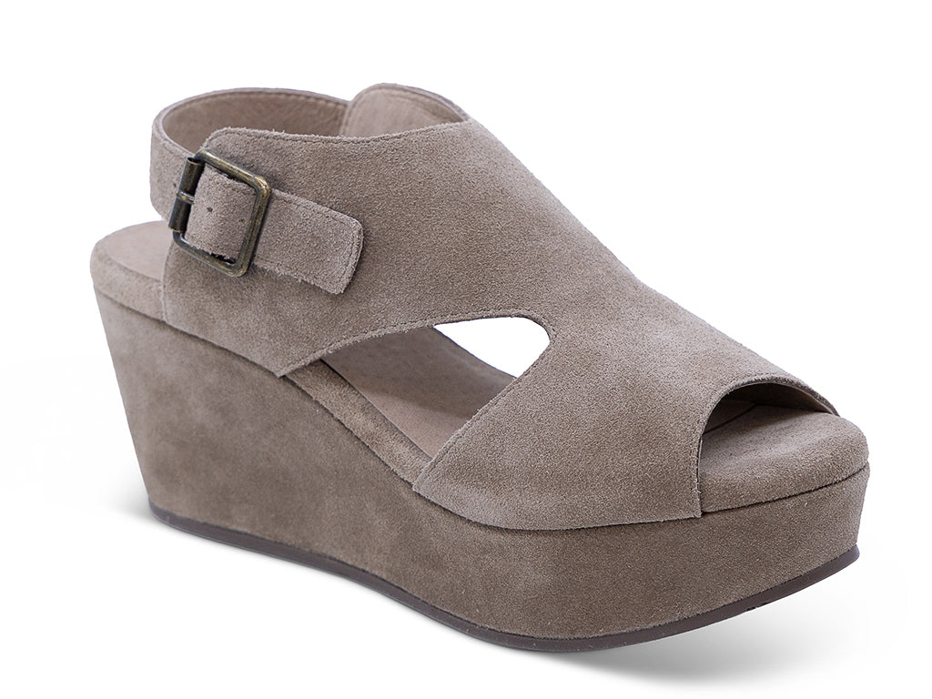 a taupe suede upper wedge sandal with cut outs and ankle strap - front 3/4 view