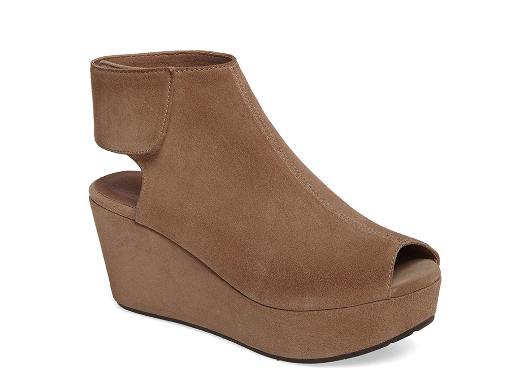 Taupe suede slide in peep toe wedge platform shoe with ankle velcro strap  on a white background side angle view