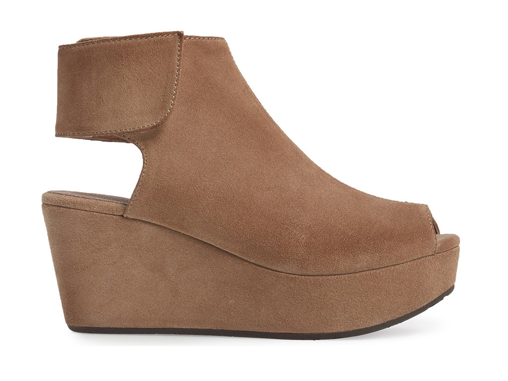Taupe suede slide in peep toe wedge platform shoe with ankle velcro strap  on a white background side view