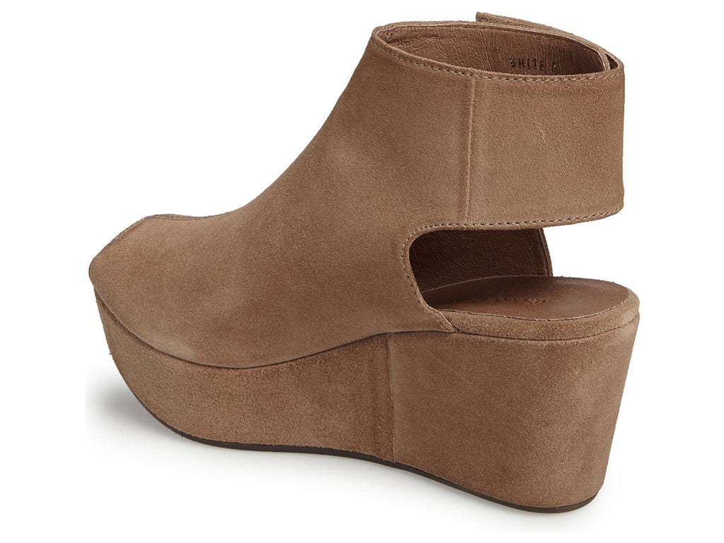 Taupe suede slide in peep toe wedge platform shoe with ankle velcro strap  on a white background side angle view