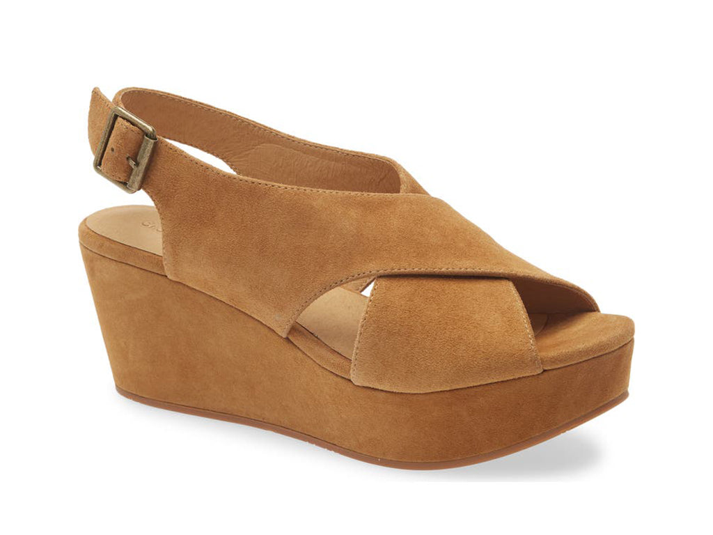 camel wedge sandal with a strap on a white background