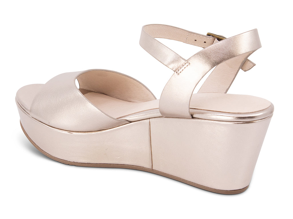 platinum wedge sandal with ankle strap - back angle view