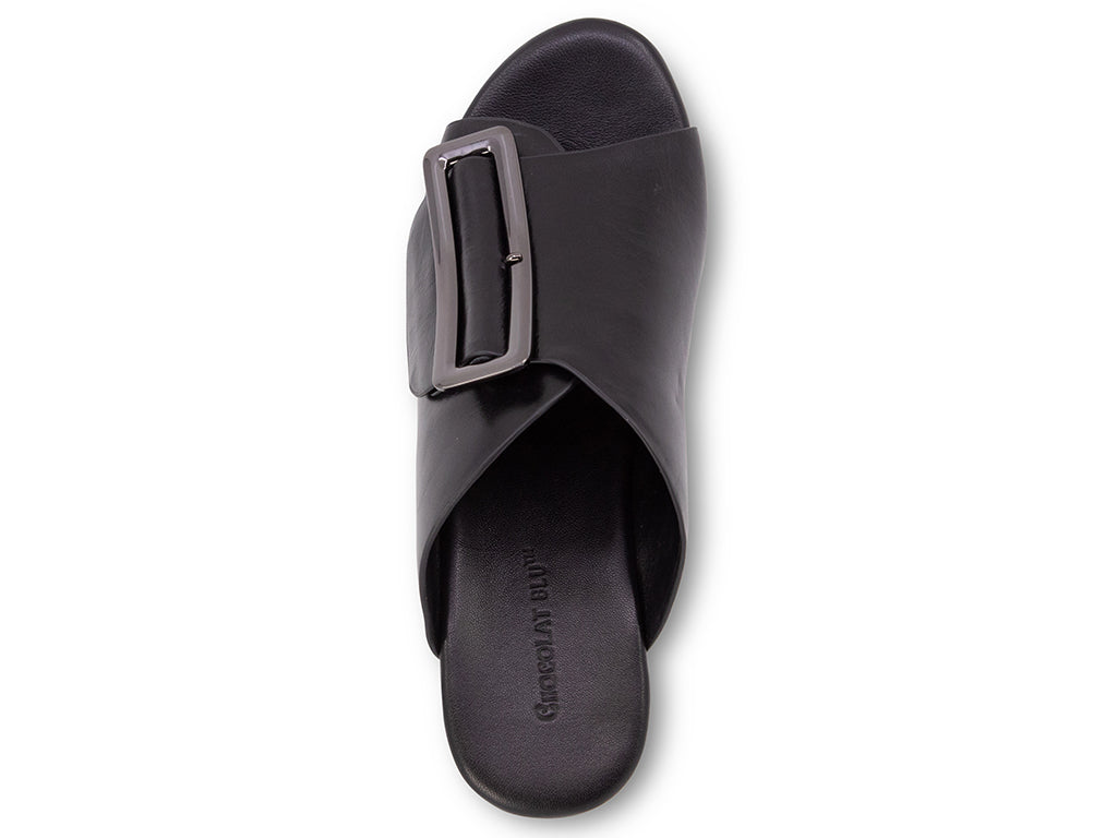 black colored wedge slide sandal with oversized silver buckle - top view