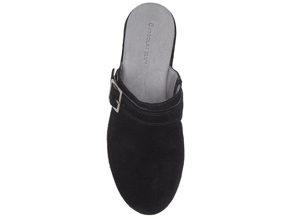 Black suede slide in clog wedge platform shoe with top strap and buckle decoration and grommet studs on a white background top view