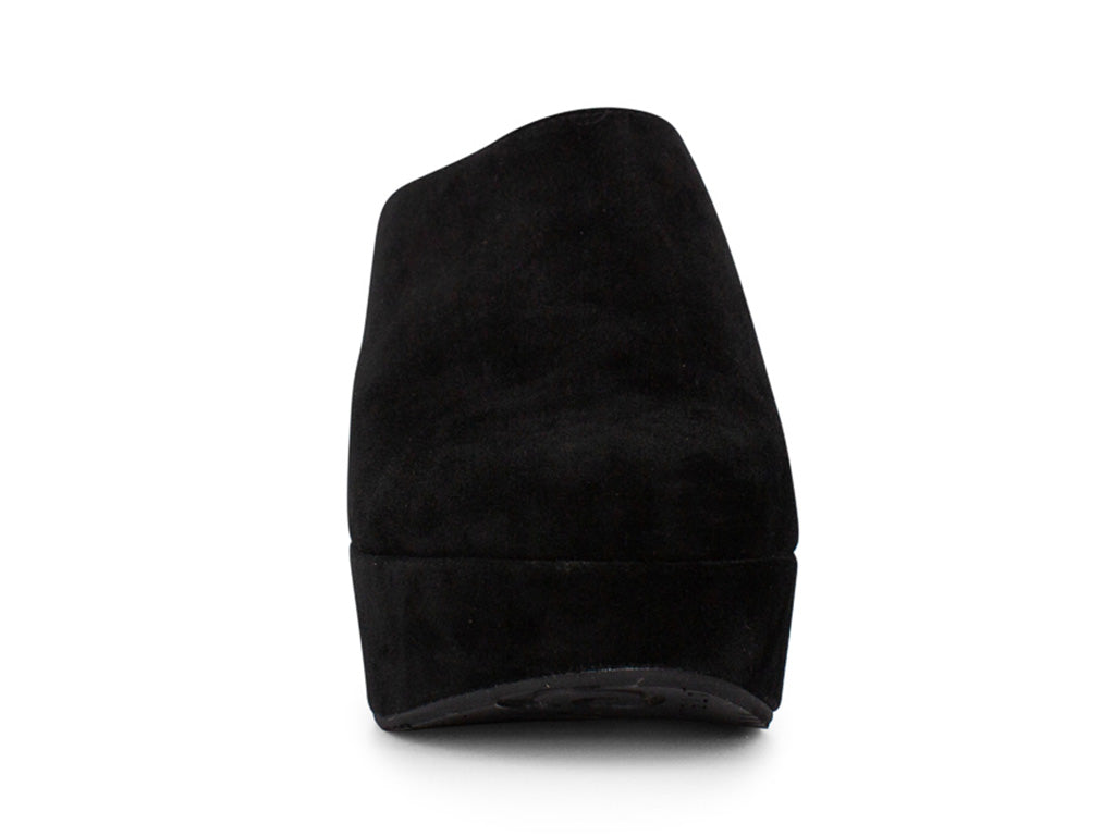 Black suede slide in wedge platform shoe on a white background front view