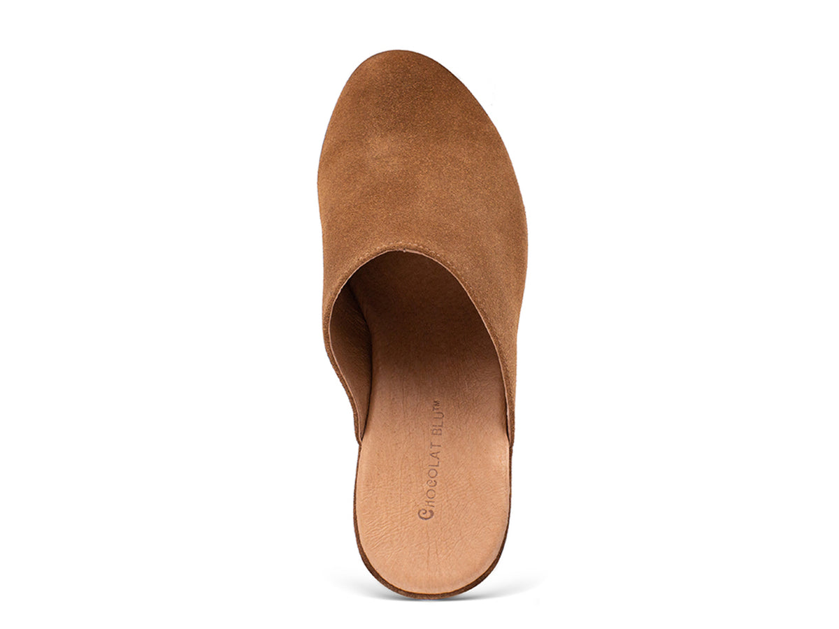 Brown suede slide in wedge platform shoe on a white background top view
