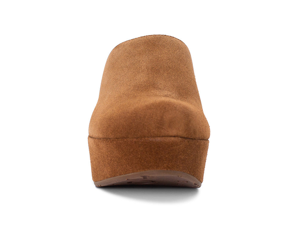 Brown suede slide in wedge platform shoe on a white background front view