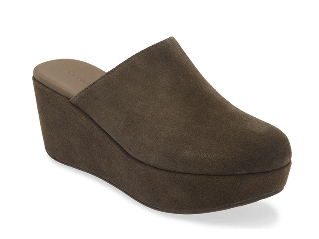 Olive suede slide in wedge platform shoe on a white background side angle view
