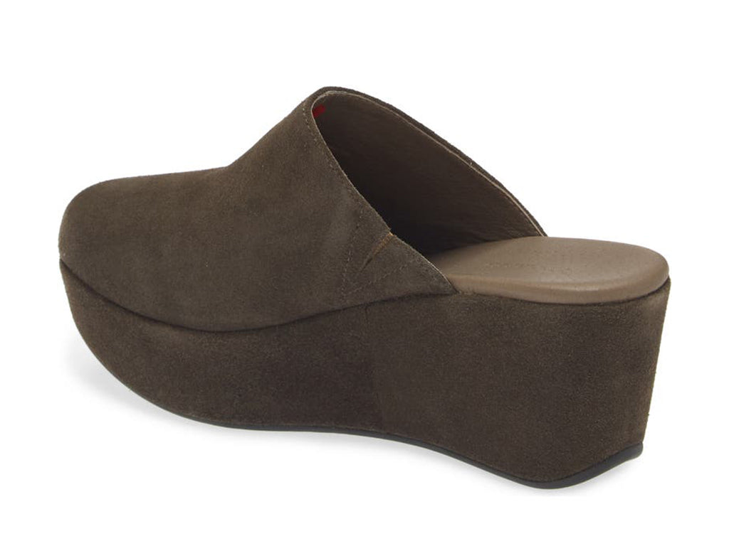 Olive suede slide in wedge platform shoe on a white background side angle view
