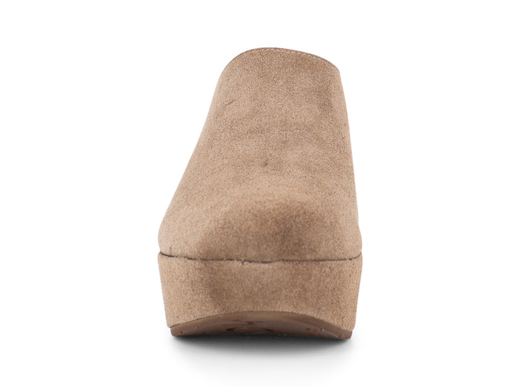 Taupe suede slide in wedge platform shoe on a white background front view