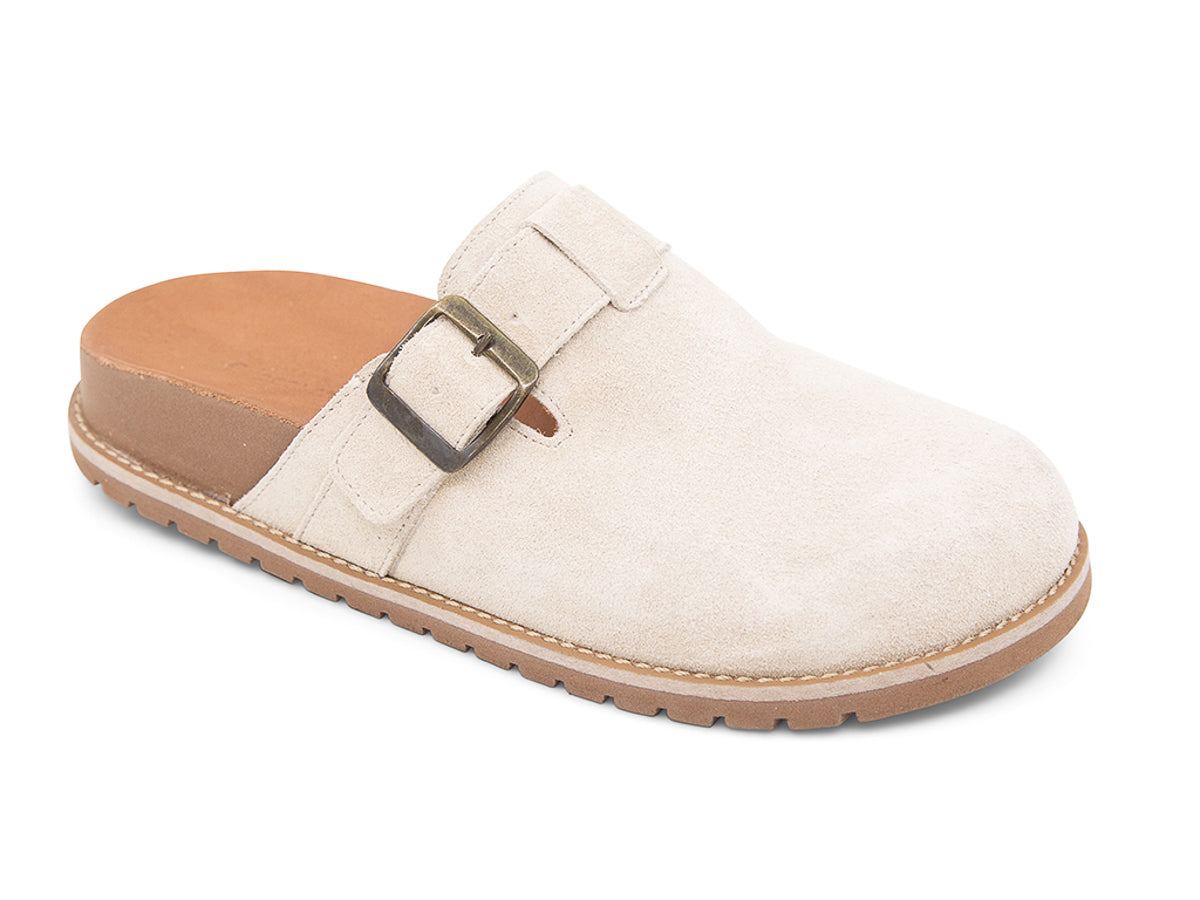 Beige slip-on shoe with a brown sole, strap and buckle on a white background side angle view