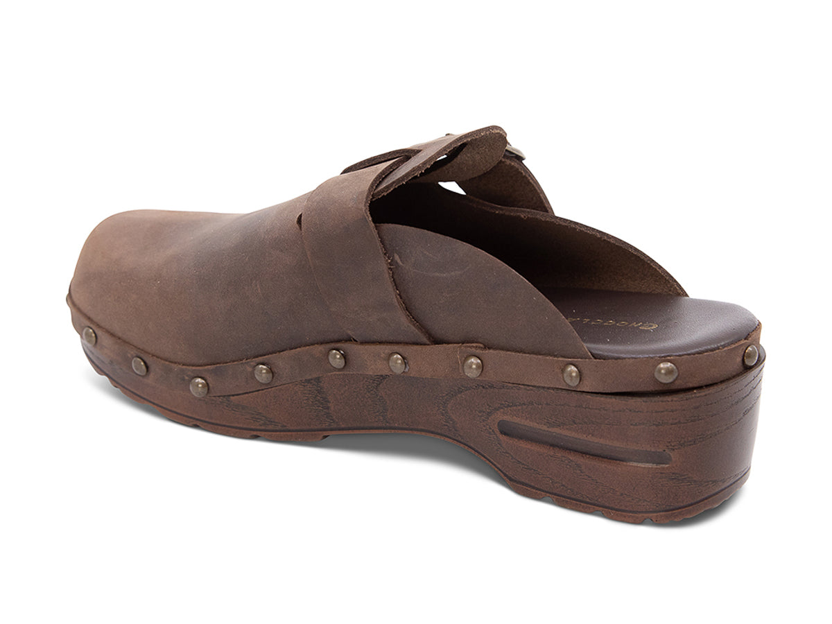 Brown leather clog shoe with strap  on a white background side angle view